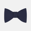 View 1 of product The Turnbull & Asser Navy Satin Silk Bow Tie is elegantly showcased against a plain white background.