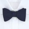 View 2 of product The Turnbull & Asser Navy Satin Silk Bow Tie is elegantly showcased against a plain white background.