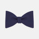 The Turnbull & Asser Navy Barathea Bow Tie features a classic butterfly shape in deep blue silk, ideal for formal occasions, shown against a white background.