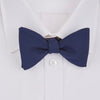 View 2 of product The Turnbull & Asser Navy Barathea Bow Tie features a classic butterfly shape in deep blue silk, ideal for formal occasions, shown against a white background.