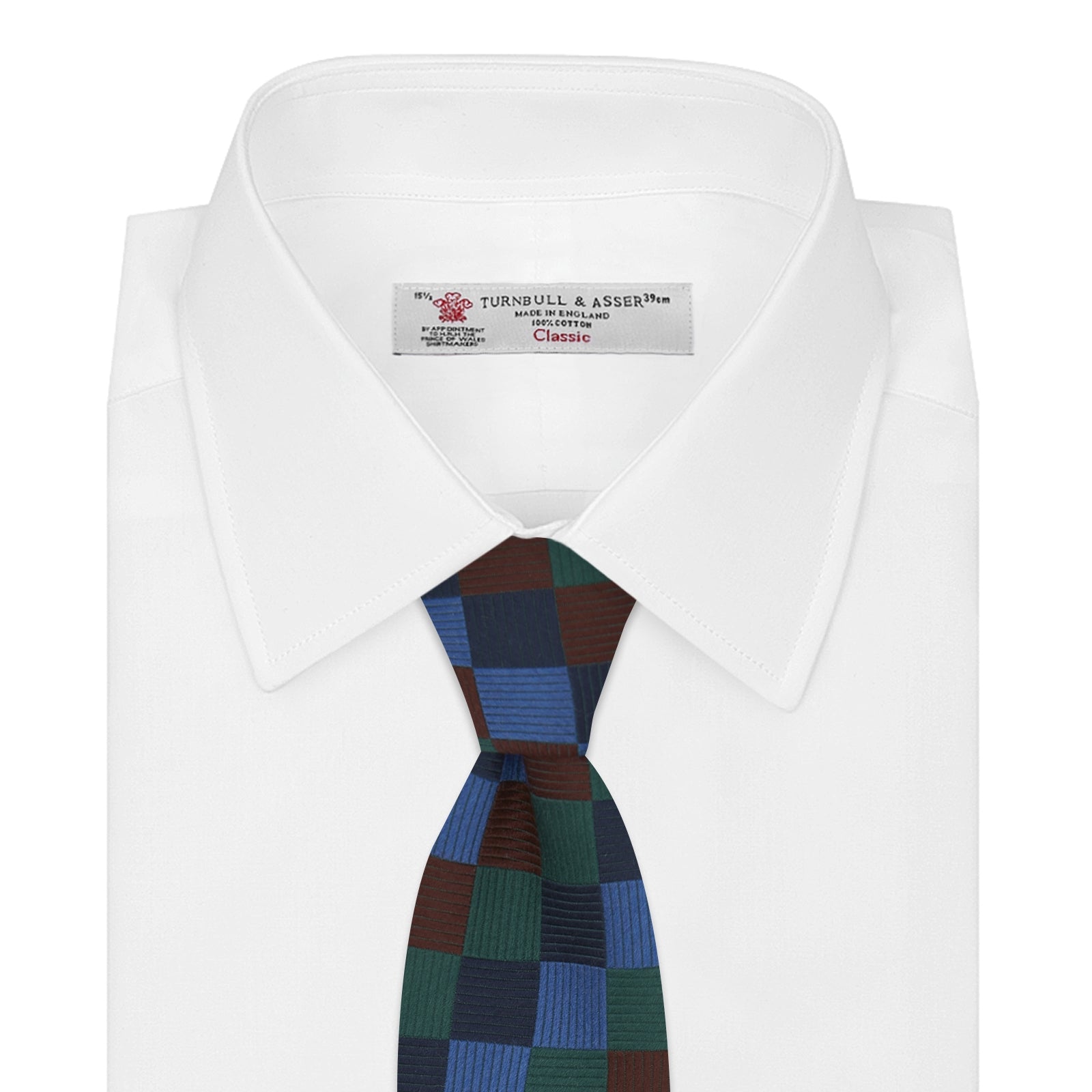 View 2 of product The Turnbull & Asser Navy and Blue Checkerboard Jacquard Wool Tie showcases a stylish checkered pattern, ideal for adding refined autumn tones to your ensemble.