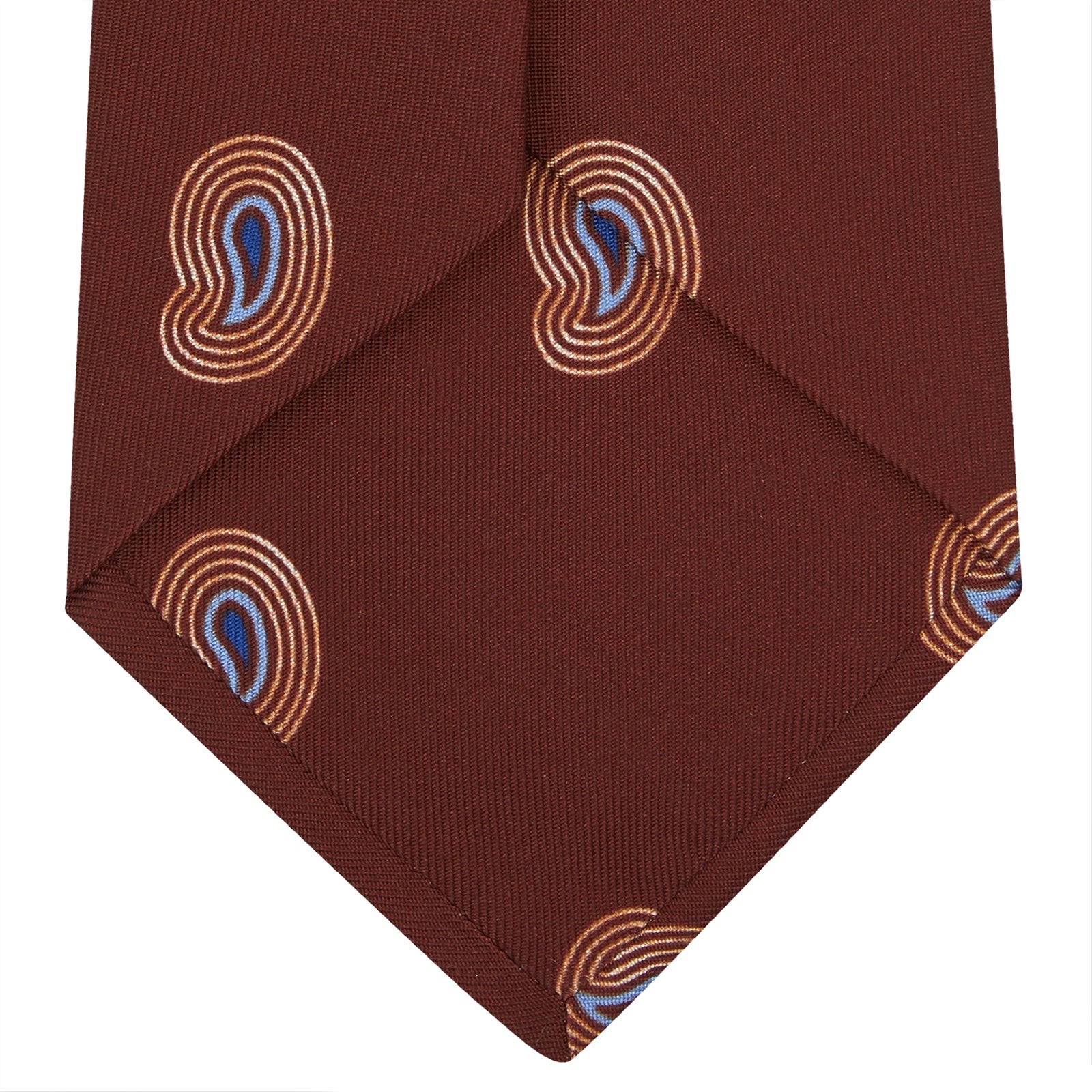 View 4 of product The Turnbull & Asser Red Pulse Paisley Silk Tie features a rolled red silk design with a repeating pattern of tan, blue, and white abstract pulse motifs.