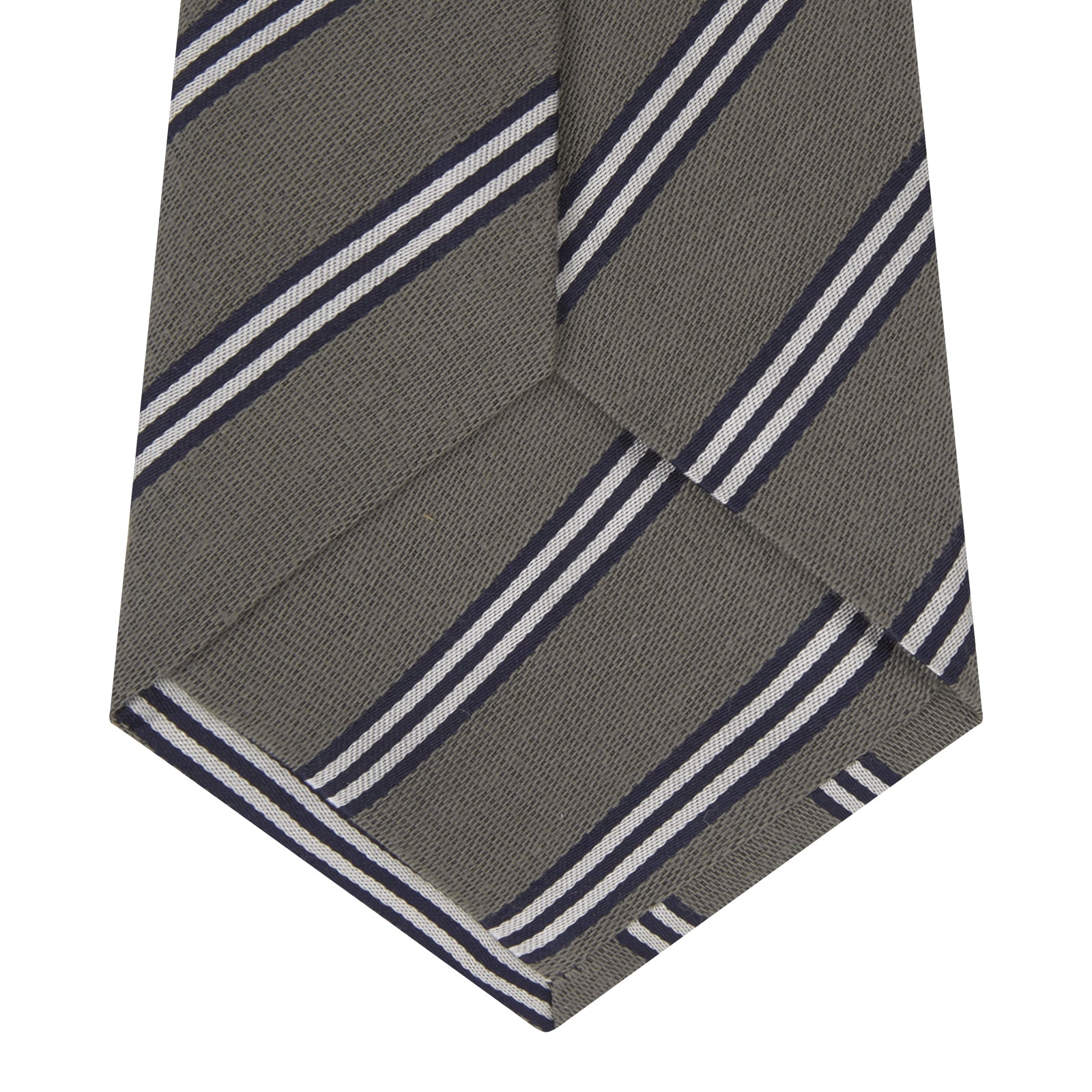 View 4 of product The Turnbull & Asser Grey Diagonal Stripe Cotton and Silk Tie features a navy, grey, and white striped pattern and is shown rolled up against a plain white background.