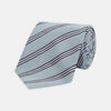 View 1 of product The Turnbull & Asser Powder Blue Diagonal Stripe Cotton and Silk Tie, featuring navy and white club stripes, is shown rolled up on a plain white background.