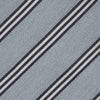 View 3 of product The Turnbull & Asser Powder Blue Diagonal Stripe Cotton and Silk Tie, featuring navy and white club stripes, is shown rolled up on a plain white background.