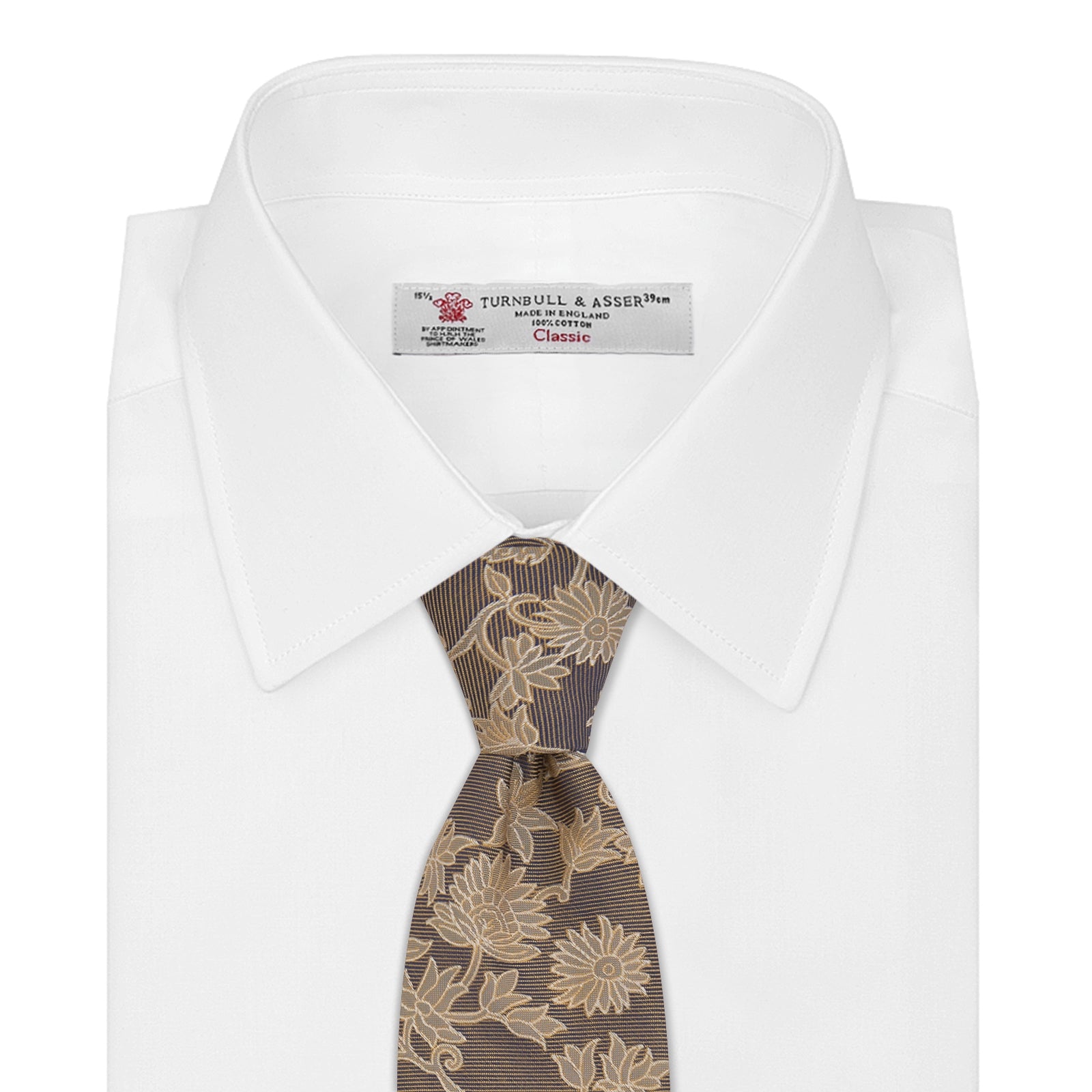 View 2 of product The Copper Floral Occasion Silk Tie by Turnbull & Asser features a gold floral jacquard pattern on brown silk, elegantly rolled on a white surface—an ideal choice for weddings.