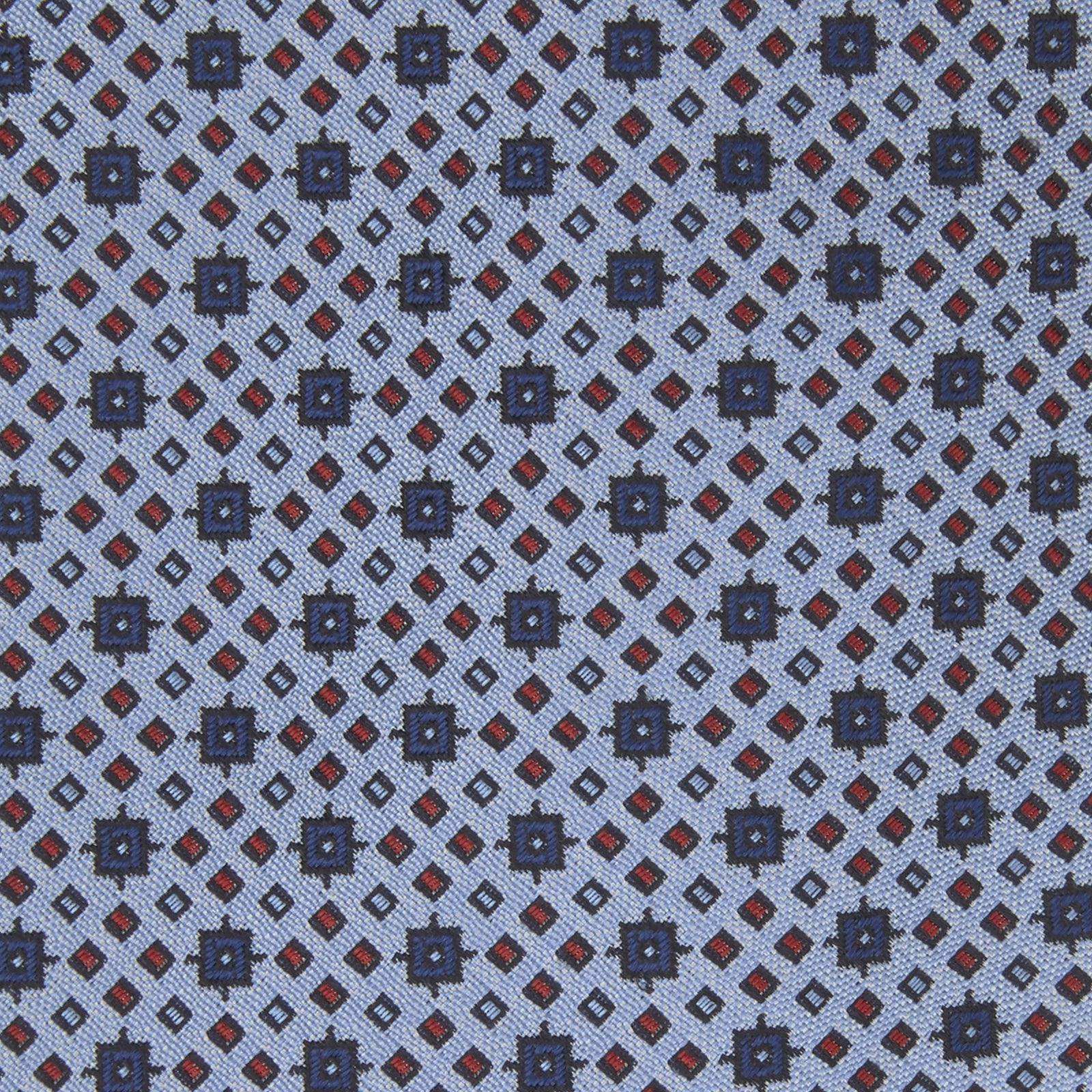 View 3 of product The Turnbull & Asser Sky Blue Geometric Silk Tie features a mid-century dark blue and maroon motif on light blue silk, shown against a white background—ideal for pairing with tailored jackets.