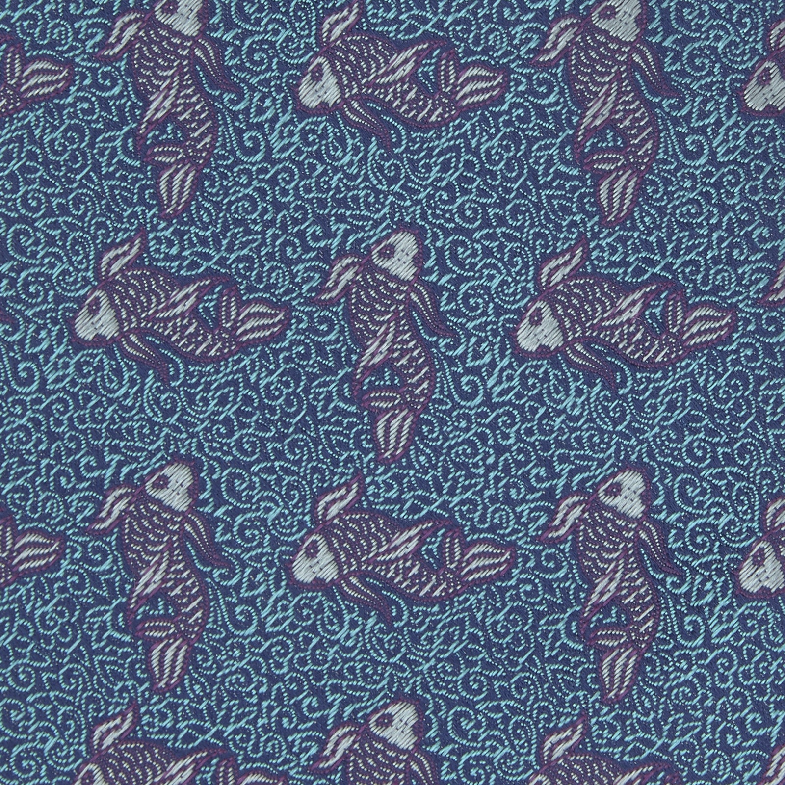 View 3 of product The Turnbull & Asser Turquoise Carp Silk Tie is woven in England, featuring a repeating white and brown carp design on a light blue background with intricate swirling patterns.