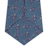 View 4 of product The Turnbull & Asser Turquoise Carp Silk Tie is woven in England, featuring a repeating white and brown carp design on a light blue background with intricate swirling patterns.