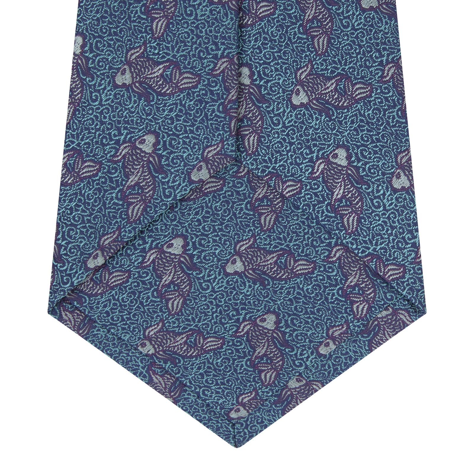 View 4 of product The Turnbull & Asser Turquoise Carp Silk Tie is woven in England, featuring a repeating white and brown carp design on a light blue background with intricate swirling patterns.