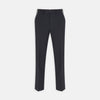View 1 of product The Turnbull & Asser Manson Navy Wool Serge Trousers feature a tailored, straight-leg fit with belt loops, front button, and side pockets, crafted from wool serge twill and displayed against a white background.