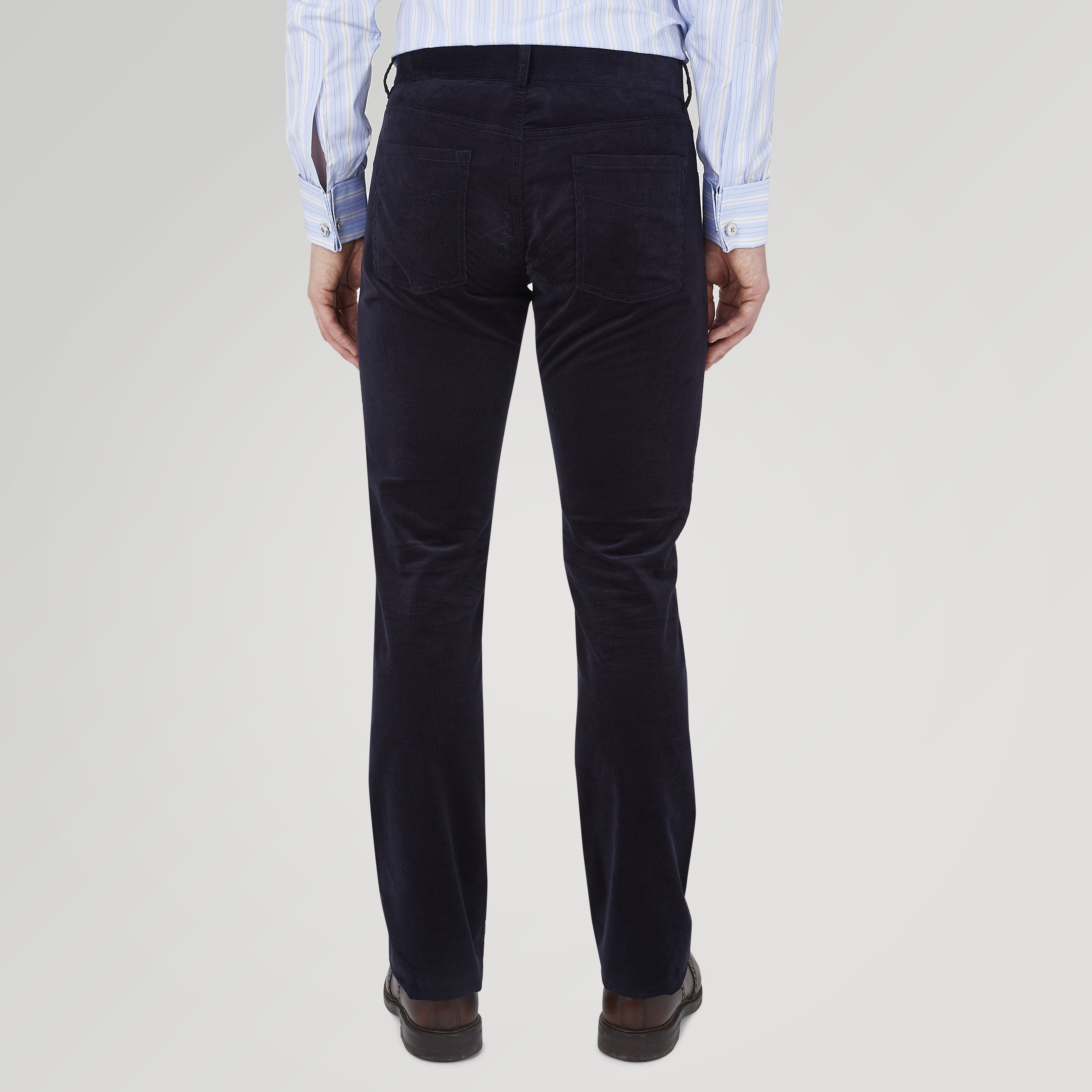 View 3 of product A pair of Turnbull & Asser Navy Cotton Cashmere Corduroy 5-Pocket Trousers, shown front-facing on a plain white background.