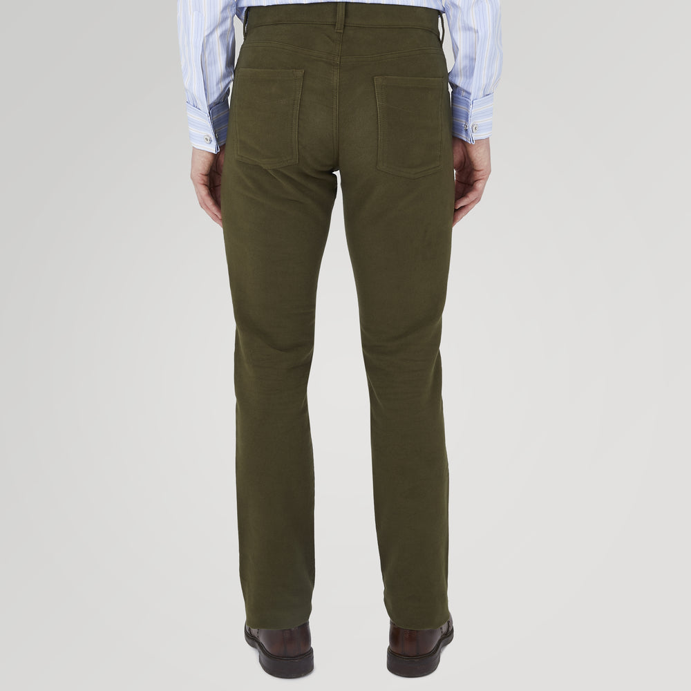 The Hanley Dark Olive Moleskin 5-Pocket Trousers by Turnbull & Asser are slim-fit casual trousers with front and back pockets, button closure, and belt loops, shown flat on a white background.