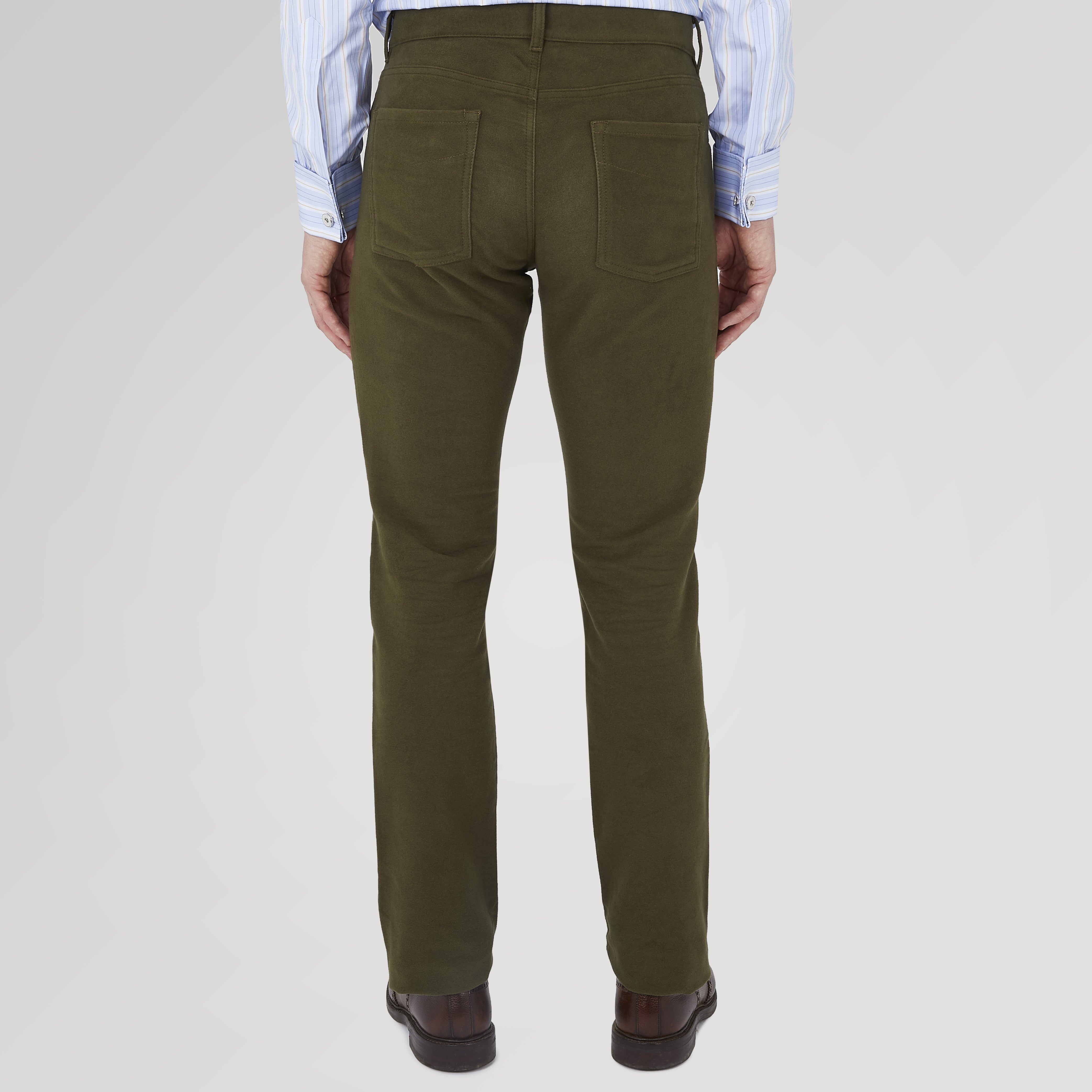 View 3 of product The Hanley Dark Olive Moleskin 5-Pocket Trousers by Turnbull & Asser are slim-fit casual trousers with front and back pockets, button closure, and belt loops, shown flat on a white background.
