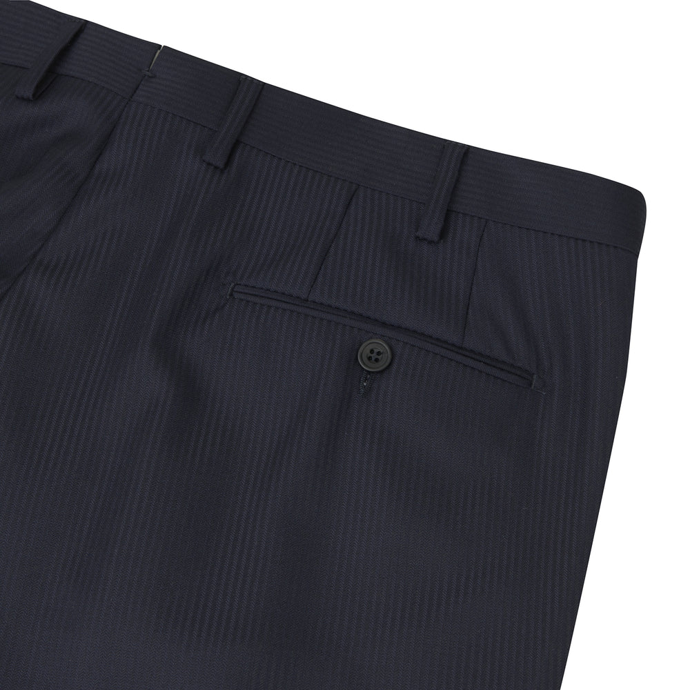 Turnbull & Asser Navy Worsted Wool Pleated Formal Trousers feature a straight leg, front zipper, and button closure, shown against a plain white background.
