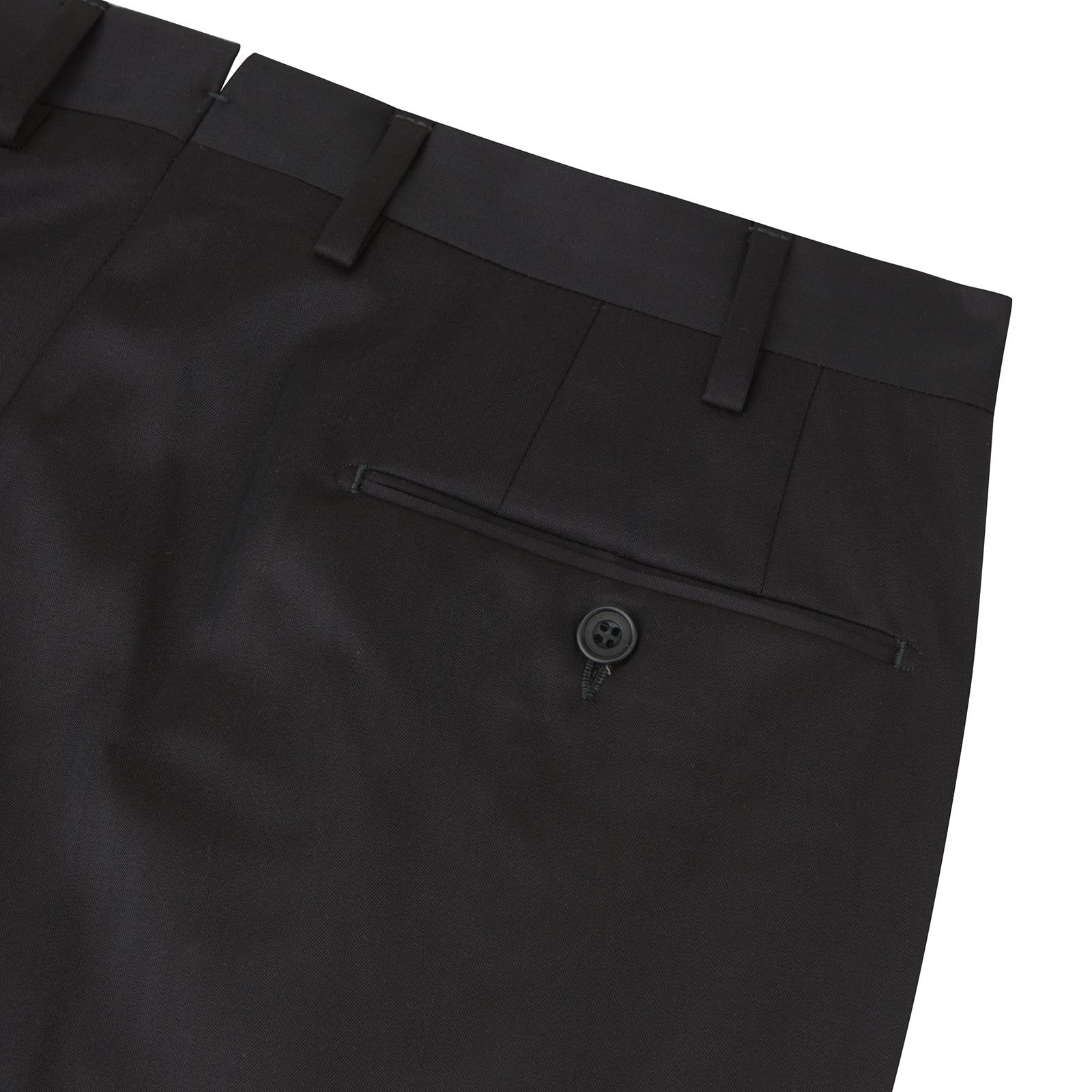 View 2 of product The Turnbull & Asser Brown Worsted Wool Pleated Formal Trousers feature belt loops, side pockets, and a button closure, crafted from fine wool and shown against a plain white background.