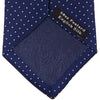 View 4 of product The Blue and White Small Spot Printed Silk Tie by Turnbull & Asser, shown rolled on a white background, features a refined white polka dot pattern—ideal for complementing any office shirt.