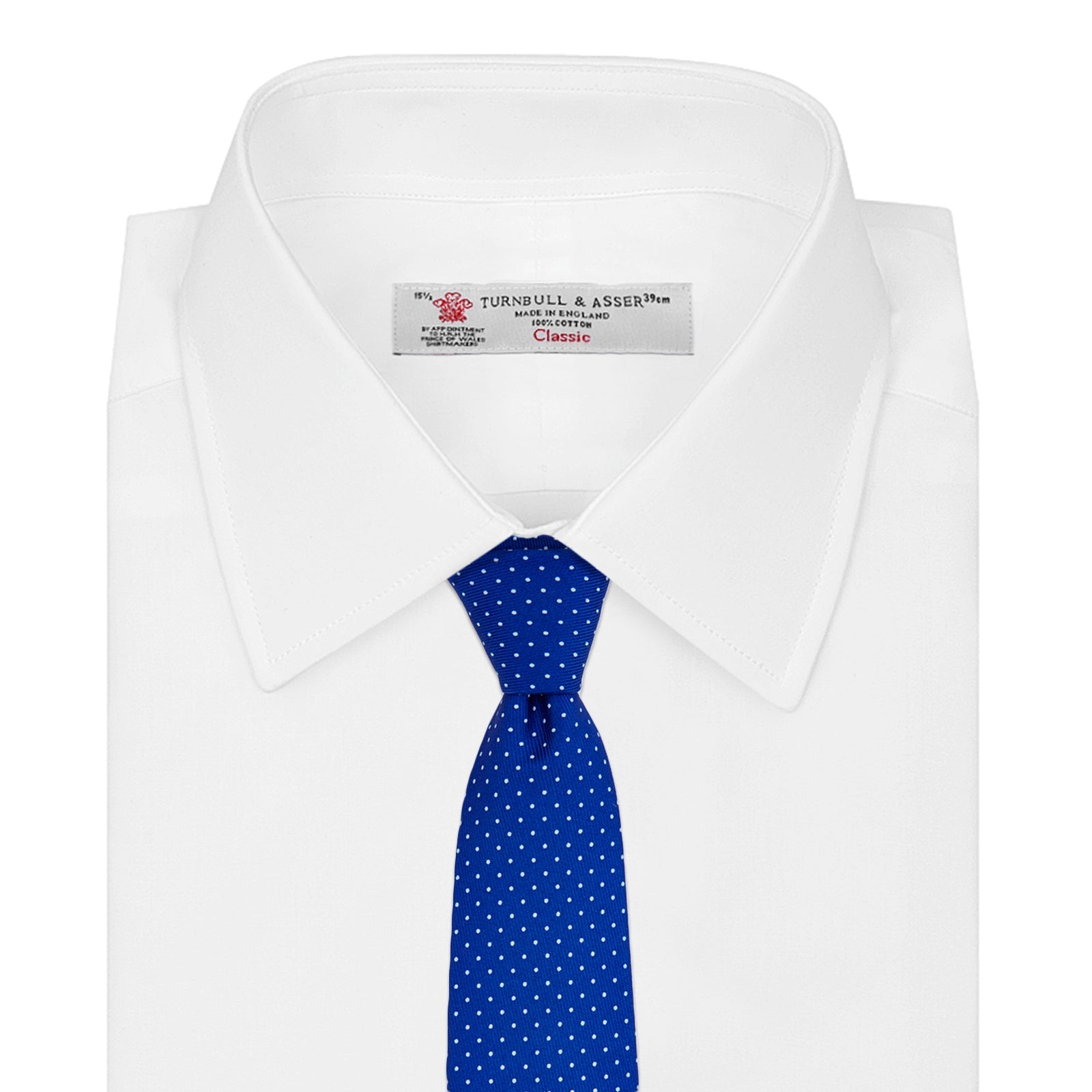 View 2 of product The Turnbull & Asser Slim Royal Blue and White Small Spot Printed Silk Tie, featuring white polka dots, is ideal for office wear and shown rolled up on a plain white background.