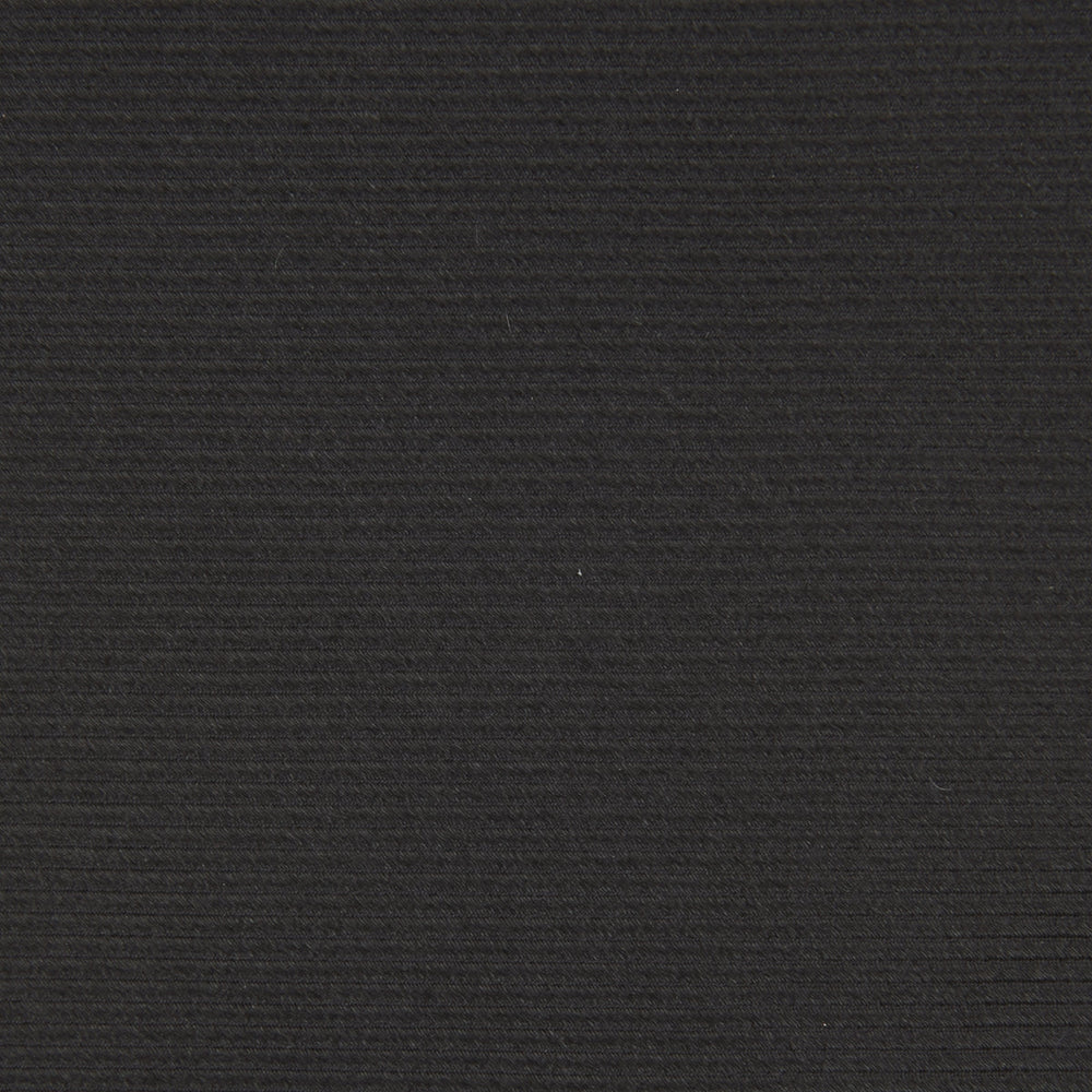 The Turnbull & Asser Slim Black Twill Silk Tie is neatly rolled on a white background, offering an ideal smart finish when paired with cotton shirts.