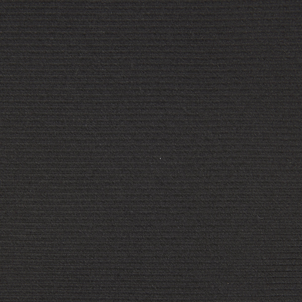 View 3 of product The Turnbull & Asser Slim Black Twill Silk Tie is neatly rolled on a white background, offering an ideal smart finish when paired with cotton shirts.