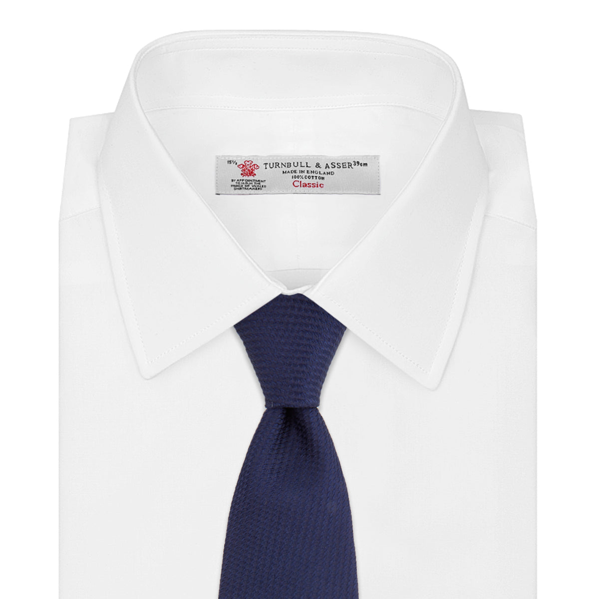 View 2 of product The Turnbull & Asser Navy Lace Silk Tie, featuring a subtle lace weave texture, is displayed rolled up on a plain white background.