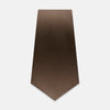 View 1 of product The Turnbull & Asser Brown Lace Silk Tie, featuring a subtle houndstooth pattern, is shown flat against a light gray background.