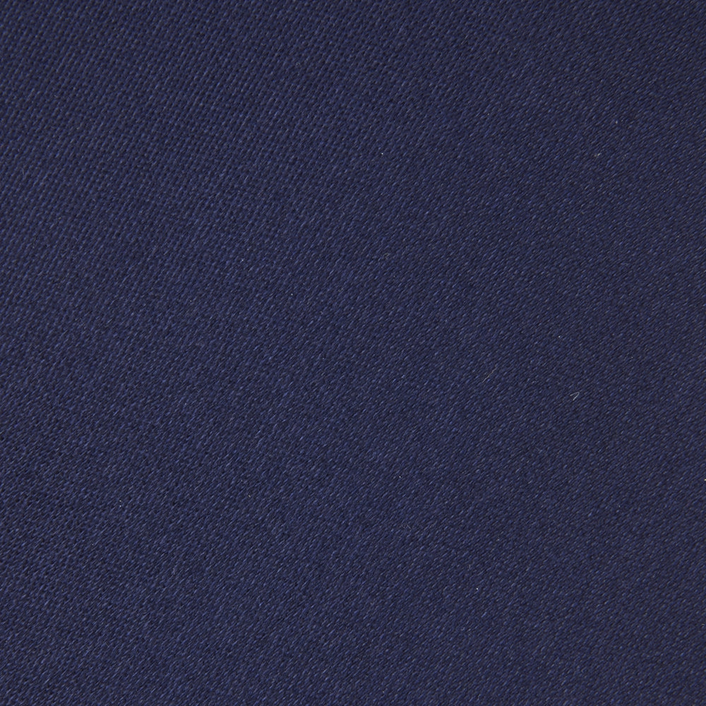 The Turnbull & Asser Seven-Fold Navy Plain Satin Silk Tie is neatly rolled and showcased against a plain light gray background.