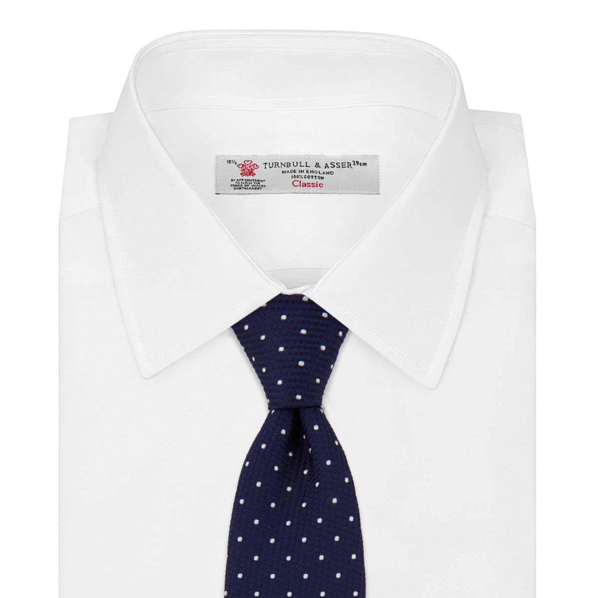 View 2 of product The Turnbull & Asser Navy and White Spot Lace Silk Tie features evenly spaced small white polka dots—perfect for adding a classic touch to any office shirt.