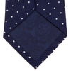 View 4 of product The Turnbull & Asser Navy and White Spot Lace Silk Tie features evenly spaced small white polka dots—perfect for adding a classic touch to any office shirt.
