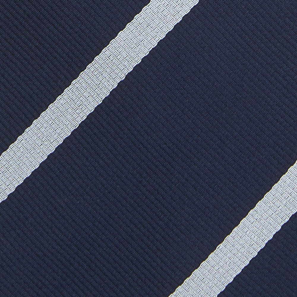 Turnbull & Asser’s Slim Navy and White Blazer Stripe Repp Silk Tie features two white diagonal stripes, rolled neatly on a white background—an ideal accessory to complement any office shirt.