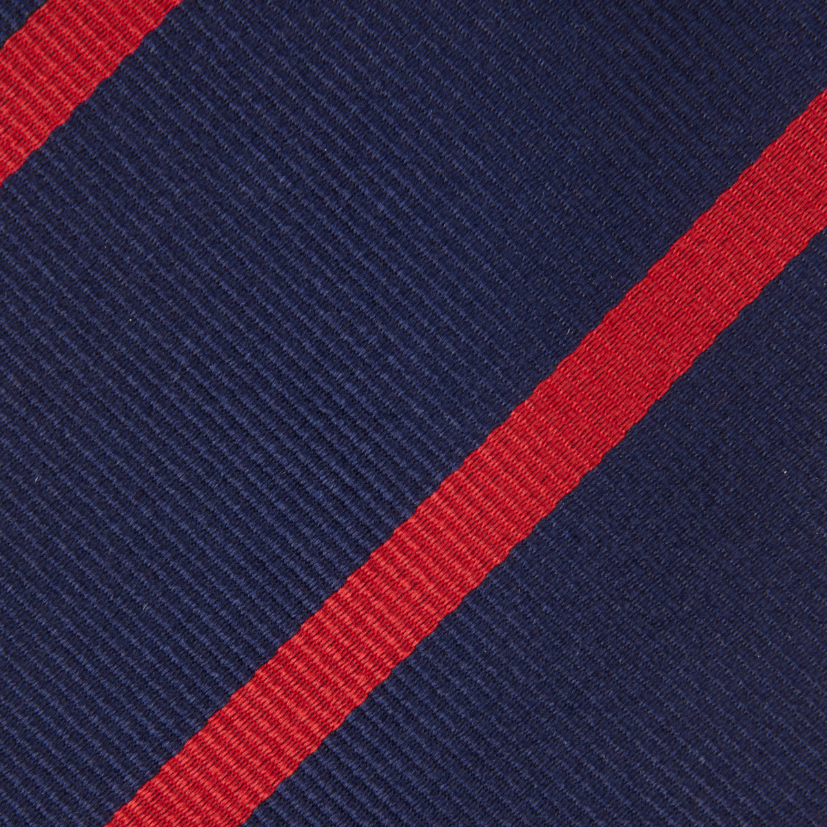 View 3 of product The Navy and Red Blazer Stripe Repp Silk Tie by Turnbull & Asser is a classic accessory, ideal for a timeless schoolboy look or to complement any sharp office shirt.