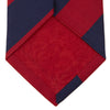 View 4 of product The Turnbull & Asser Long Navy and Red Block Stripe Repp Silk Tie features bold diagonal stripes on white—an ideal office shirt companion.