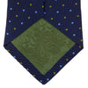 View 4 of product The Turnbull & Asser Navy, Blue & Green Spot Lace Silk Tie features small, evenly spaced blue and green spots—perfect for adding a refined touch to your favorite office shirt.