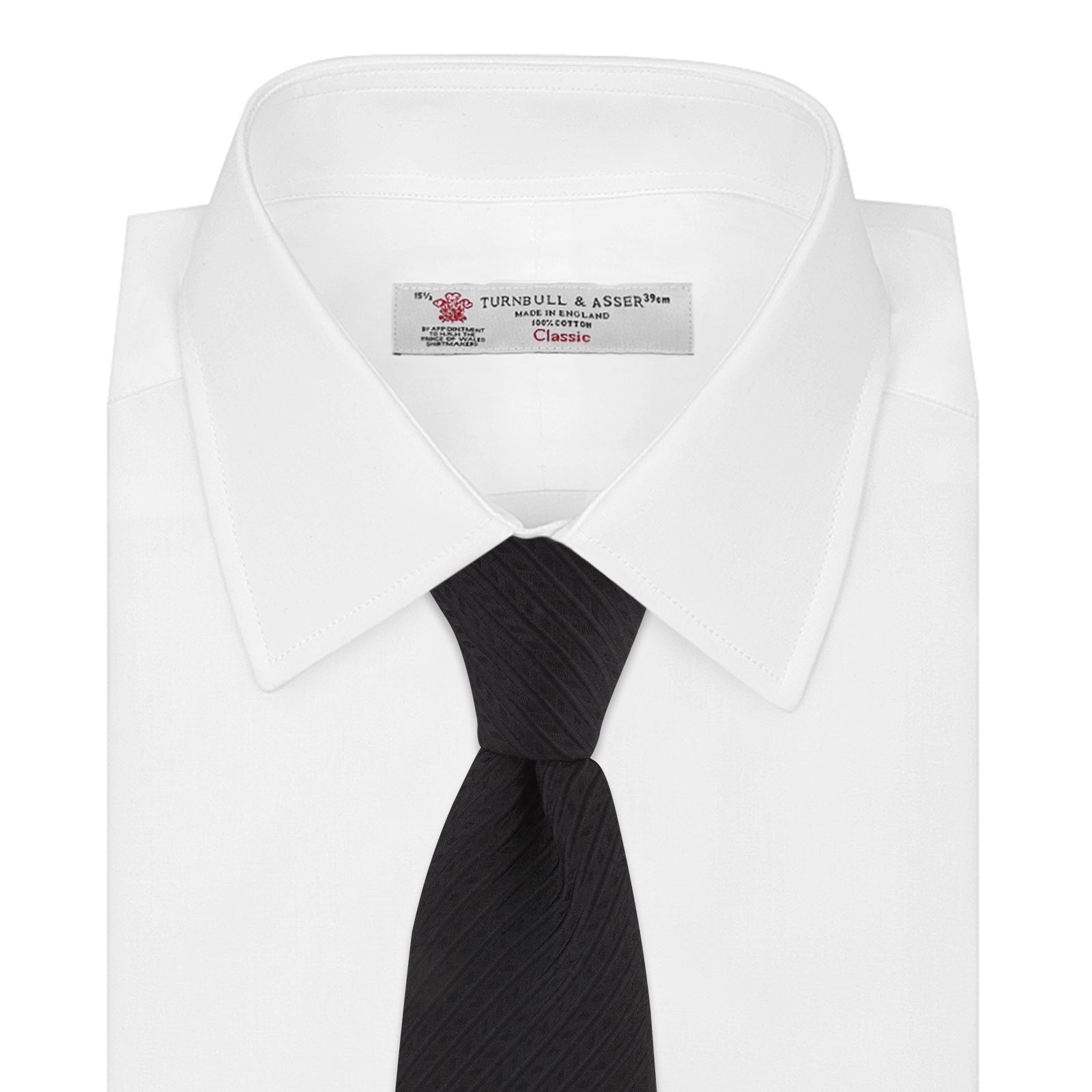 View 2 of product The Black Ottoman Silk Tie by Turnbull & Asser features a subtle wavy textured pattern and is crafted from heavyweight ribbed silk, shown rolled up against a plain white background.