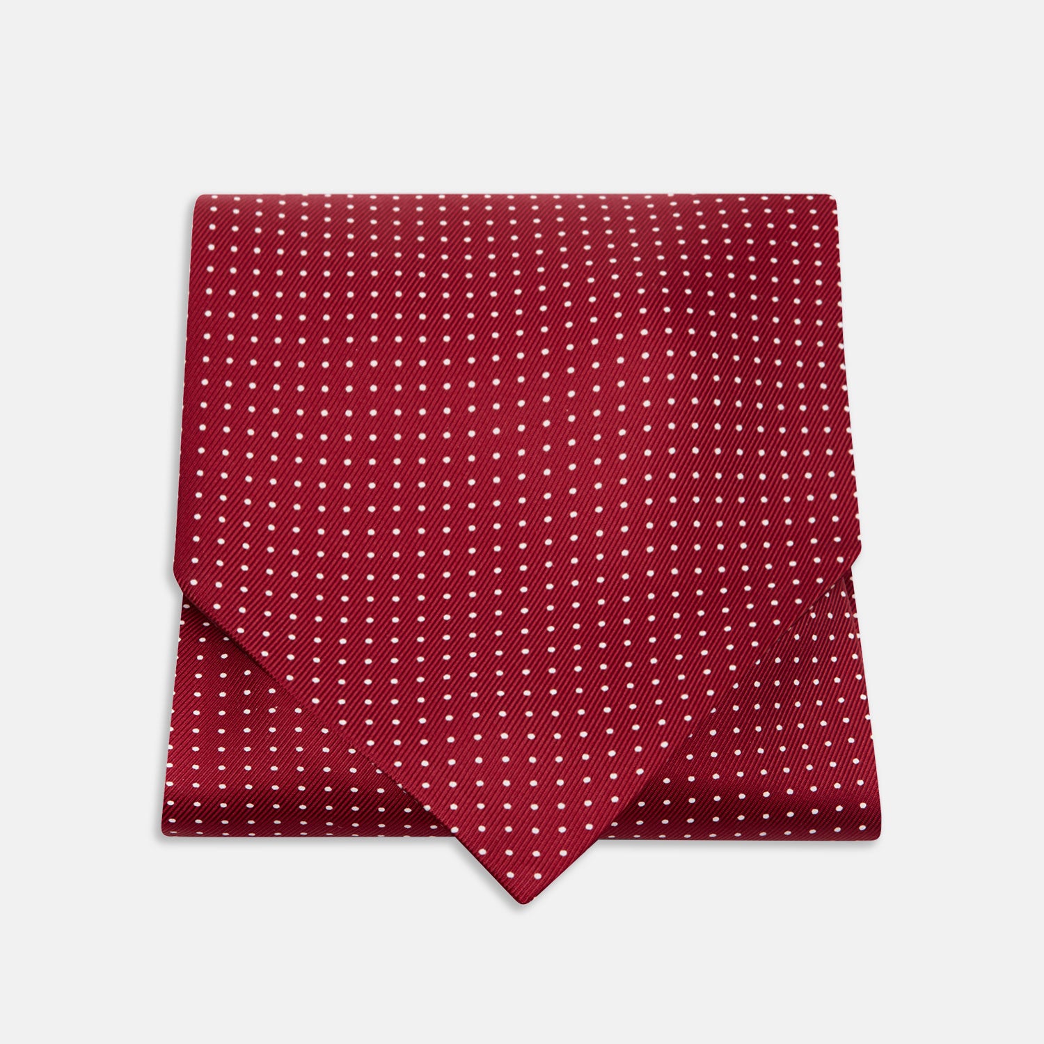 View 1 of product The Burgundy and White Mini Spot Silk Cravat by Turnbull & Asser adds refined detail—ideal neckwear for wedding guests, especially paired with a matching maroon pocket square.