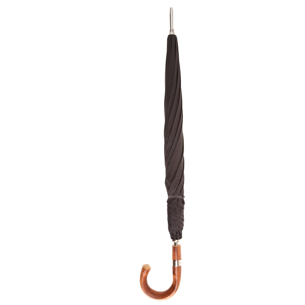 A practical accessory for unpredictable English weather, this Turnbull & Asser dark grey umbrella with a chestnut crook handle is shown elegantly against a plain white background.