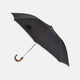 A brown Turnbull & Asser telescopic umbrella with a black maple crook handle, opened and displayed against a plain white background.