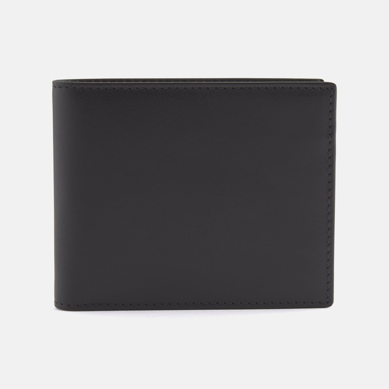 View 1 of product The Turnbull & Asser Black Leather Billfold is a stylish wallet shown closed and standing upright against a white background.