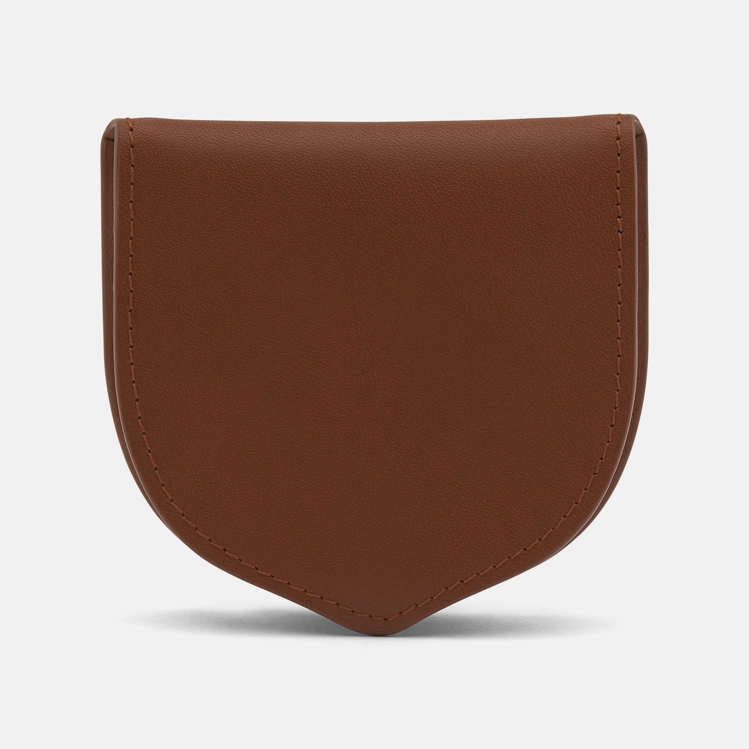 View 1 of product A classic light tan leather Tray Purse by Turnbull & Asser, featuring visible edge stitching and shown upright against a white background.