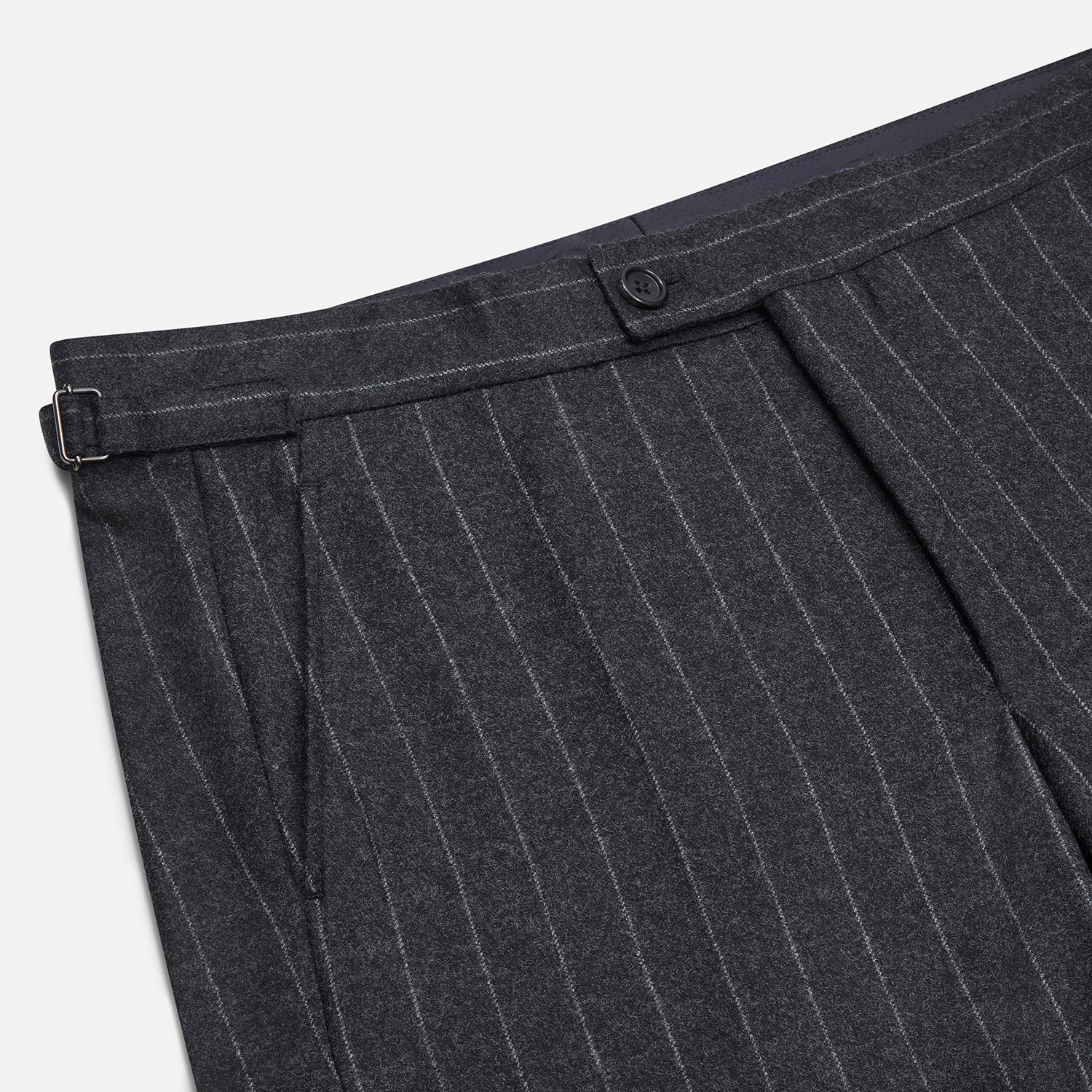 View 2 of product The Charcoal Pinstripe Henry Trousers by Turnbull & Asser feature white vertical stripes, a button and zip closure, belt loops, and side pockets, shown against a plain white background.