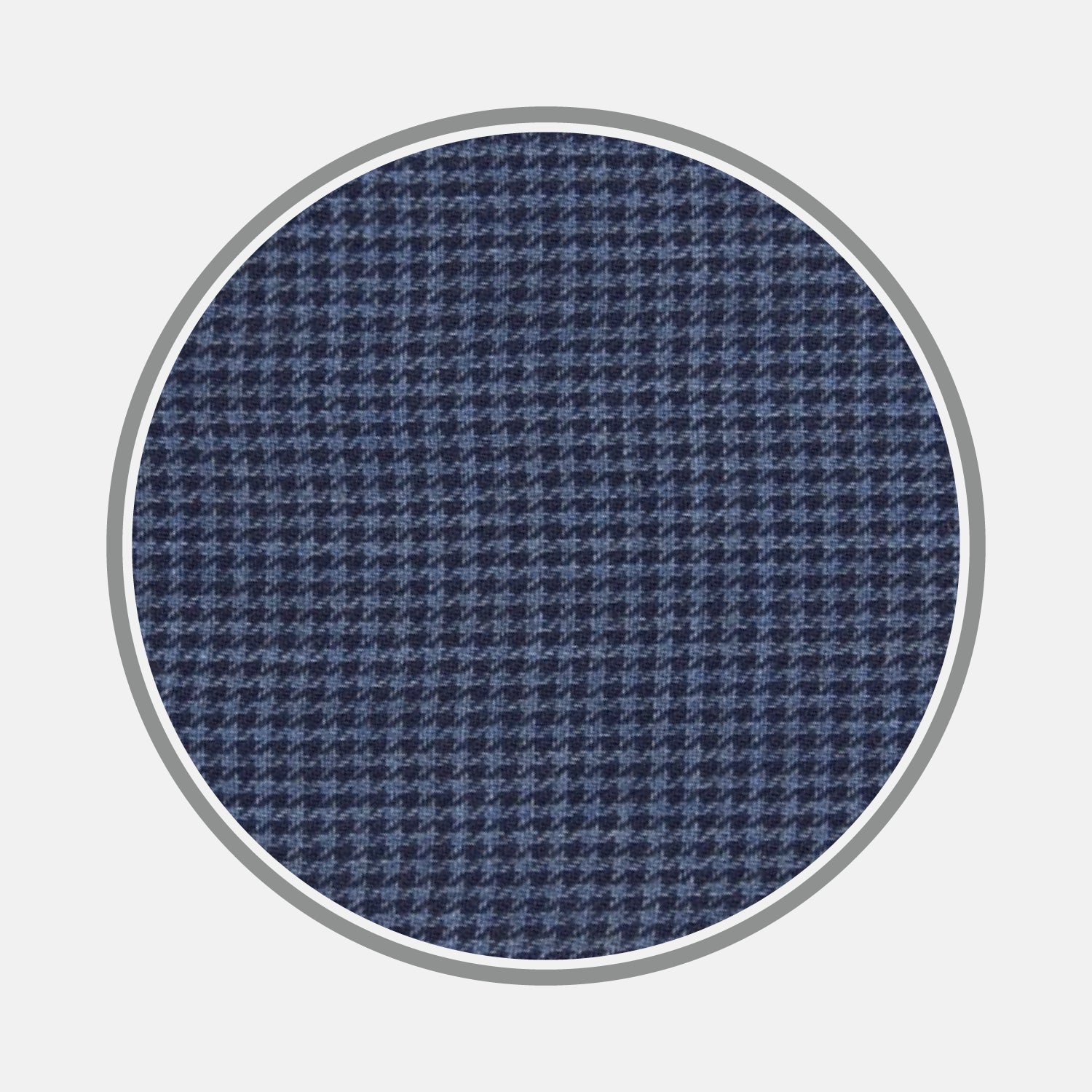 View 1 of product A circular swatch of Turnbull & Asser's Navy Check Flannel Fabric features a small repeating houndstooth pattern in navy blue, set on a white background with a thin gray border.