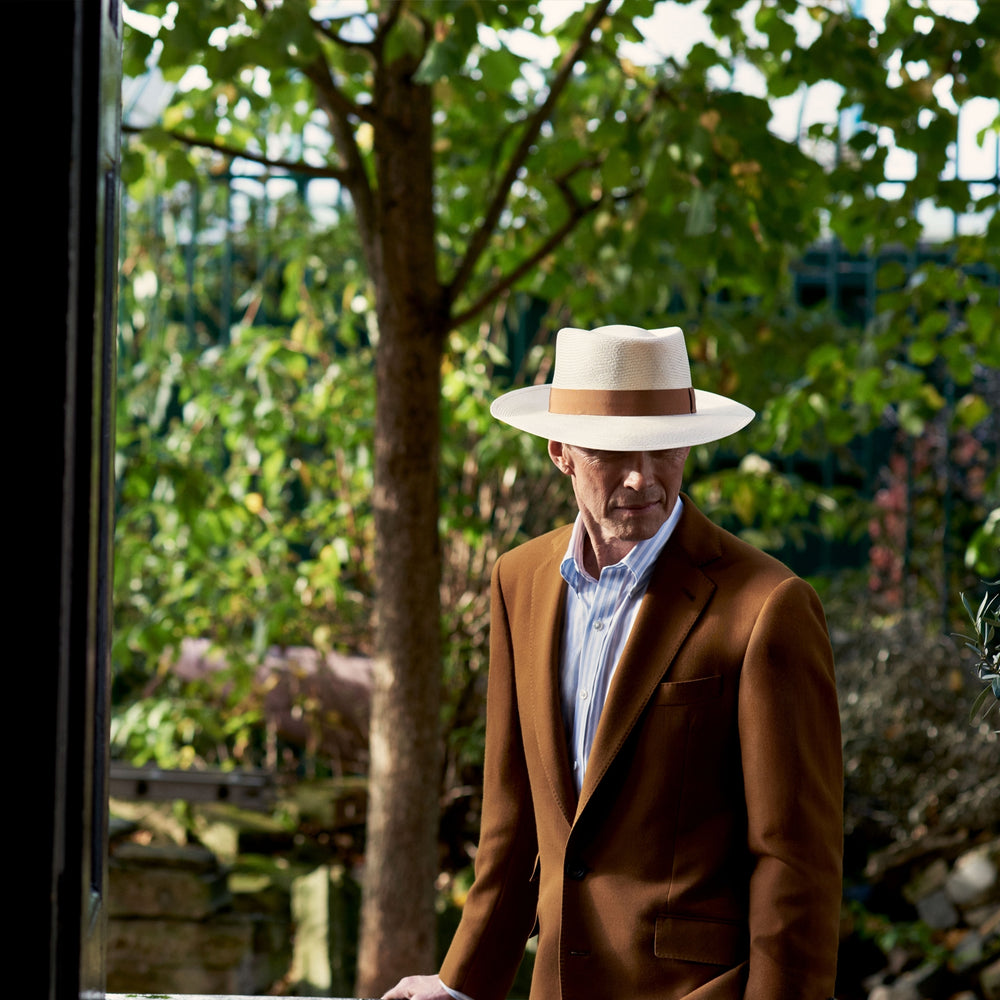 The Turnbull & Asser Tobacco Plainweave Cashmere Jacket is a single-breasted brown summer jacket with two buttons, notch lapels, and flap pockets, tailored in Italy and shown on a plain white background.