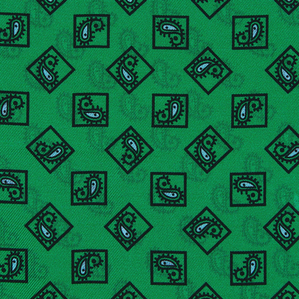 The Green & Blue Double-Faced Paisley Silk Bandana Pocket Square by Turnbull & Asser features a detailed paisley and geometric print with brand accents at the corners.