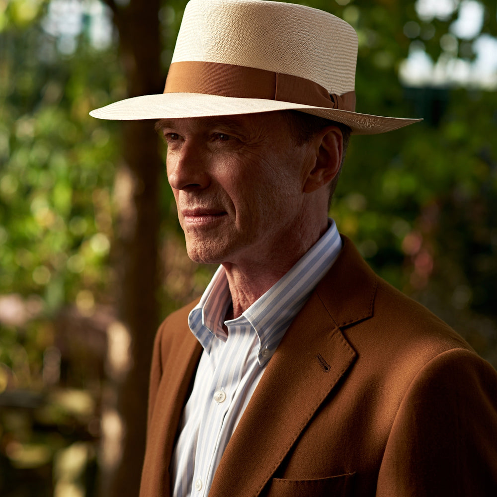 The Turnbull & Asser Tobacco Plainweave Cashmere Jacket is a single-breasted brown summer jacket with two buttons, notch lapels, and flap pockets, tailored in Italy and shown on a plain white background.