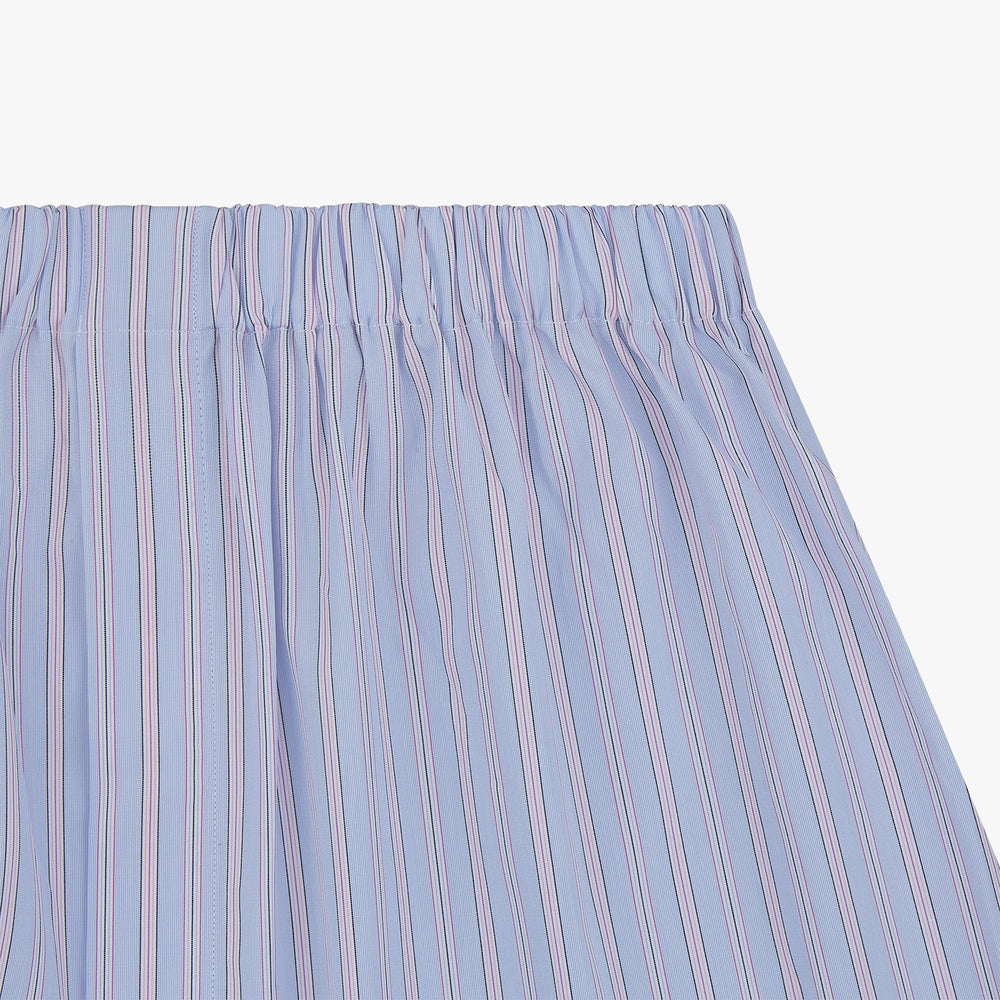 Turnbull & Asser's Blue and Pink Stripe Poplin Cotton Boxer Shorts feature an elastic waistband, loose fit, and thin pink and blue vertical stripes, shown here against a plain white background.