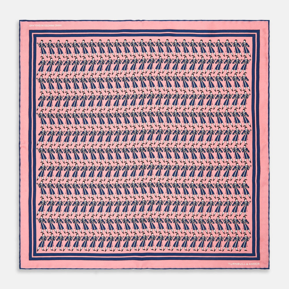The Pink Dressing Gowns Pocket Square by Turnbull & Asser features a pink base inspired by classic dressing gowns, with black and white illustrated golfers in swinging poses and navy and pink striped borders.