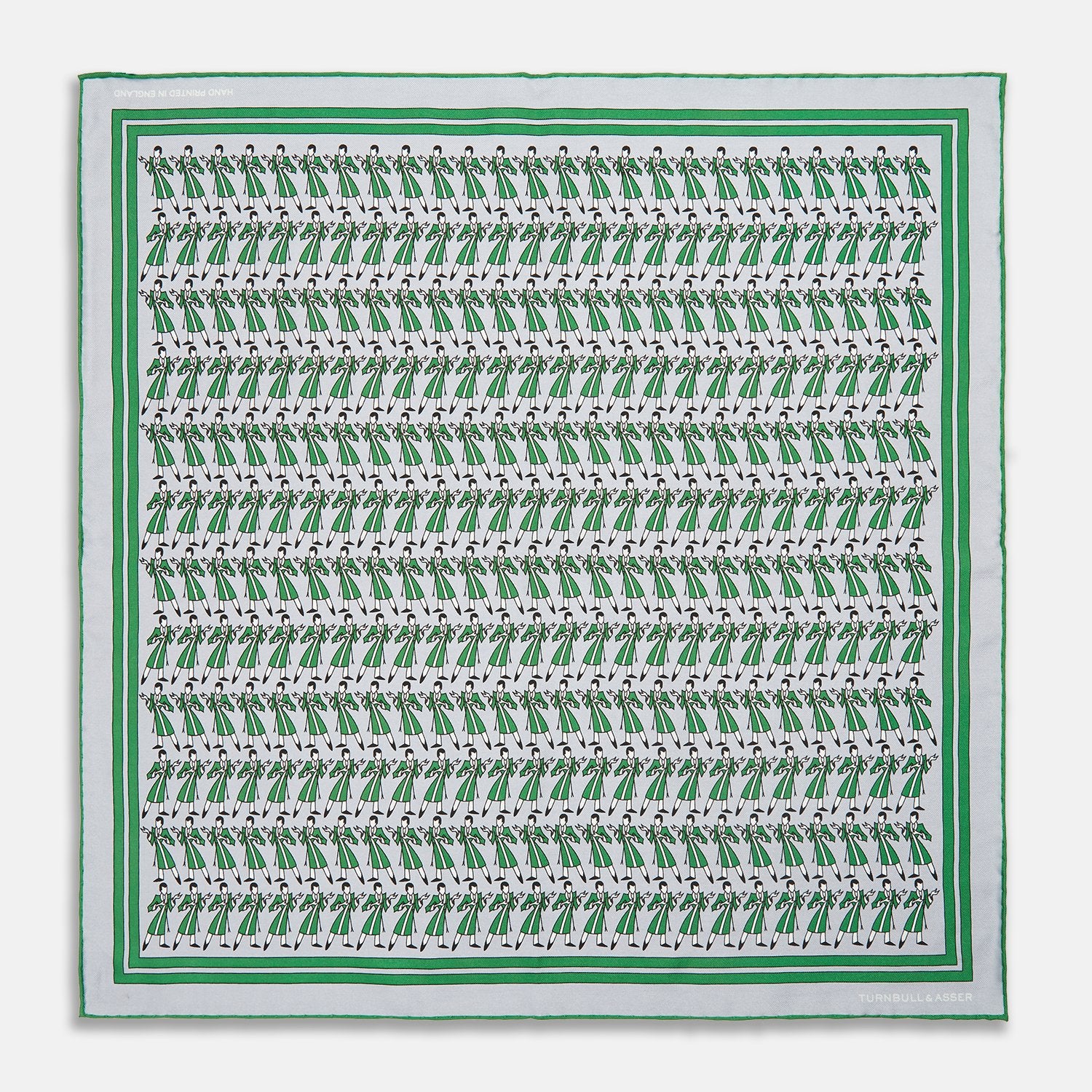 View 1 of product The Turnbull & Asser Green Dressing Gowns Pocket Square features a white silk base with green lines and a repeating pattern of green and black illustrated golfers, inspired by classic Turnbull dressing gown designs.