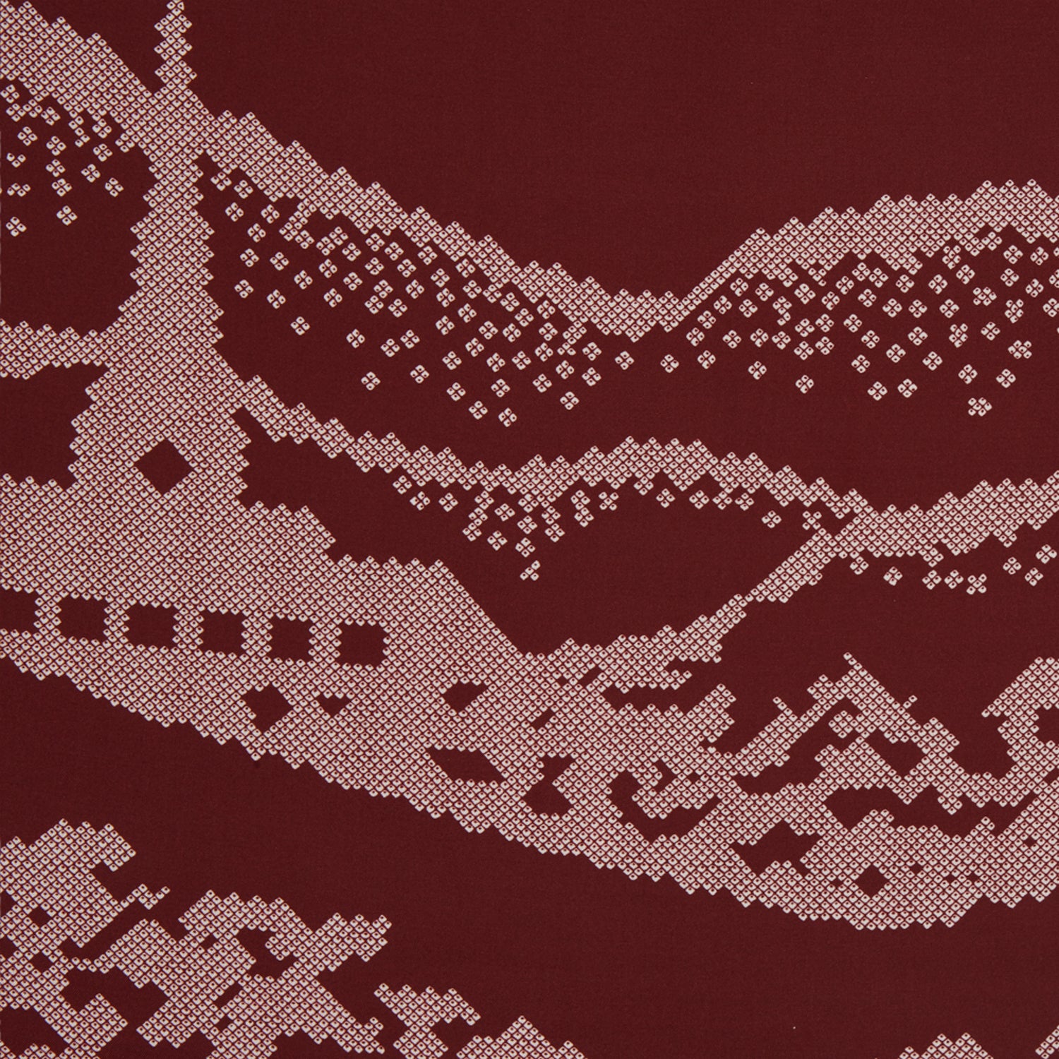 View 2 of product The Burgundy Snowscape Motif Silk Extra Large Scarf by Turnbull & Asser features a hand-rolled edge and a pink cross-stitch village scene—houses, church, hills—printed in England. A refined winter accessory.