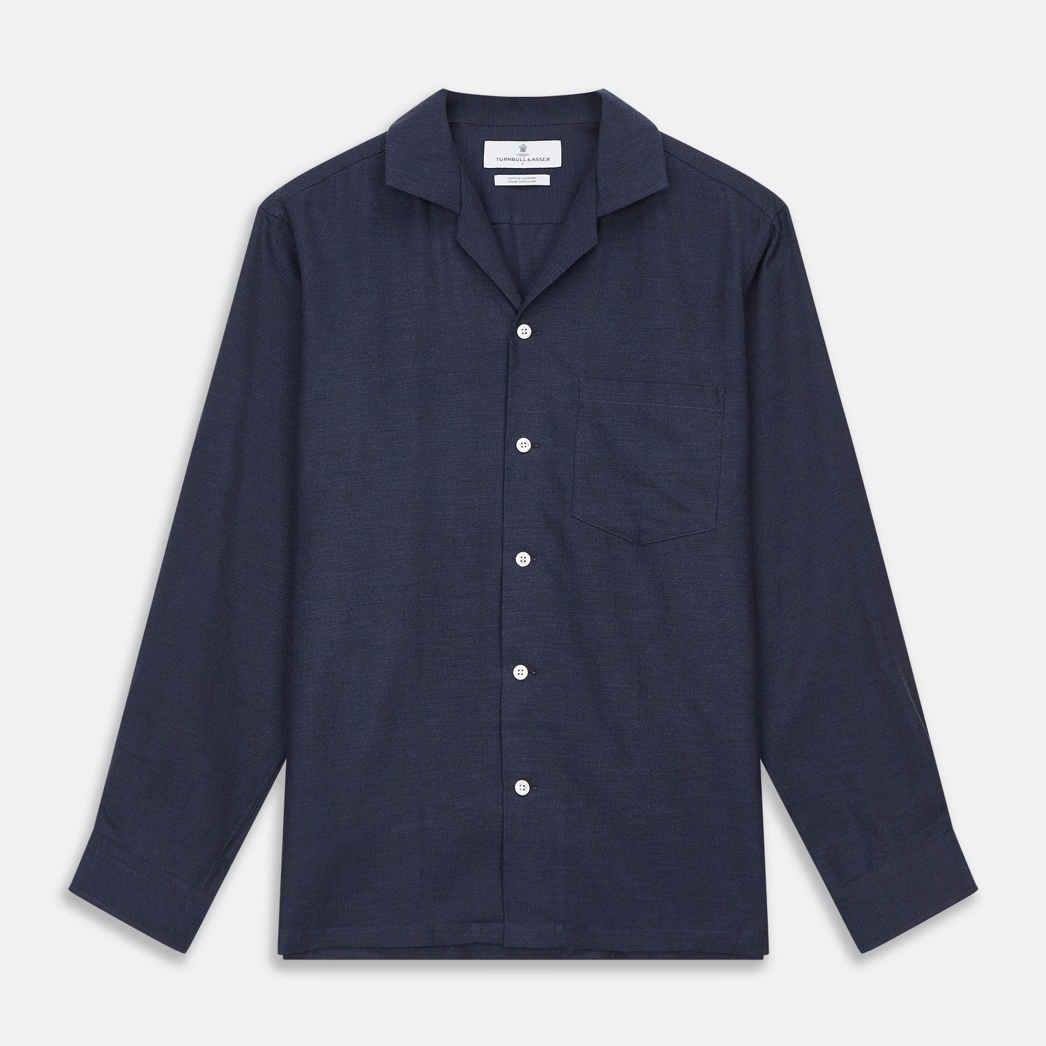View 1 of product The Turnbull & Asser Holiday Fit Navy Cotton and Cashmere Blend Shirt features 1-button cuffs, a notched collar, and a single chest pocket, shown against a plain white background.