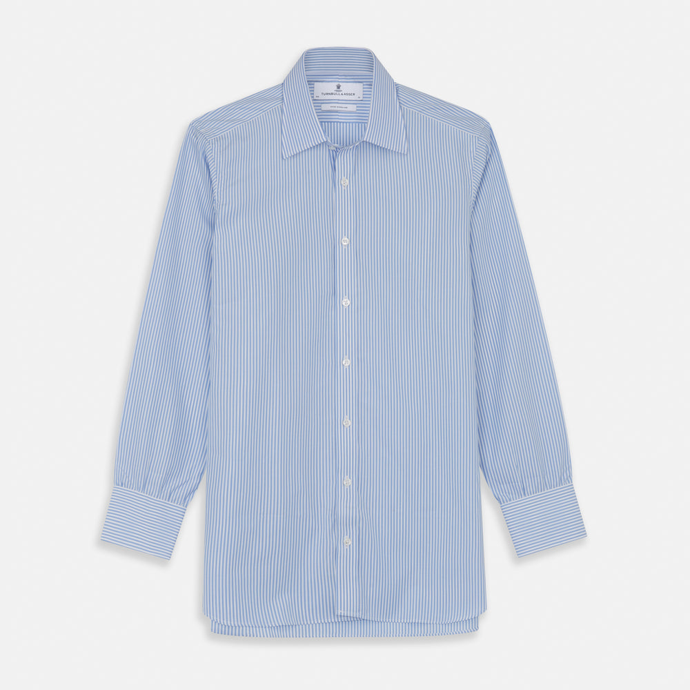 The Turnbull & Asser Light Blue Bengal Stripe Shirt features white vertical stripes, a classic T&A collar, and 3-button cuffs. Buttoned down the front, it’s laid flat on a white background for a timeless British look.